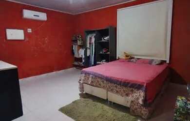 Imagem: A casa possui 3 Dormitórios, 2 Banheiros, 1 Vaga na garagem