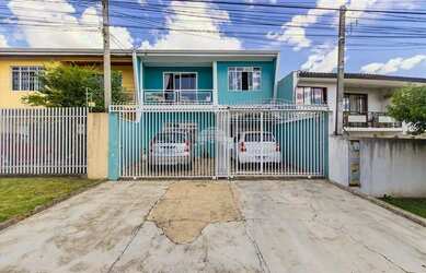Imagem: A casa possui 3 Dormitórios, 1 Banheiro, 3 Vagas na garagem