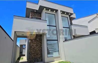 Imagem: A casa possui 2 Dormitórios, 3 Banheiros, 2 Vagas na garagem