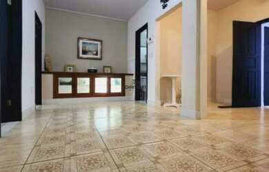 Imagem: A casa possui 3 Dormitórios, 2 Banheiros, 1 Vaga na garagem