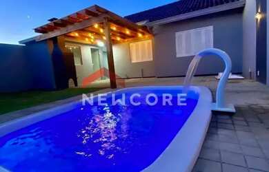 Imagem: A casa possui 2 Dormitórios, 1 Banheiro, 3 Vagas na garagem