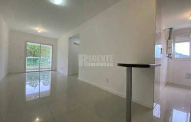 Imagem: O apartamento possui 2 Dormitórios, 1 Banheiro, 2 Vagas na