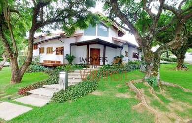 Imagem: A casa em condomínio possui 5 Dormitórios, 5 Banheiros, 5