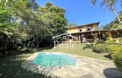 Imagem: A casa em condomínio possui 4 Dormitórios, 3 Banheiros, 2