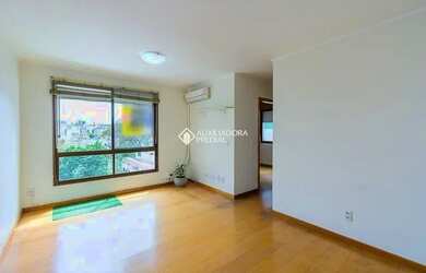 Imagem: O apartamento possui 2 Dormitórios, 1 Banheiro, 1 Vaga na garagem