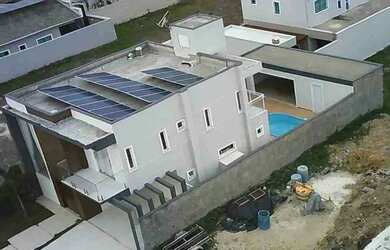 Imagem: A casa em condomínio possui 4 Dormitórios, 4 Banheiros, 3