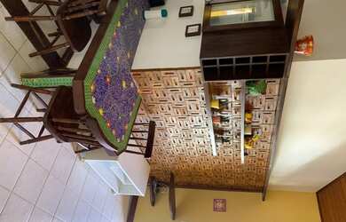 Imagem: O apartamento possui 1 Dormitório, 1 Banheiro, 1 Vaga na garagem