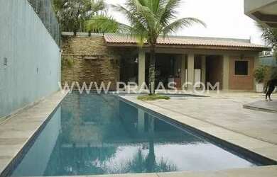 Imagem: A casa possui 5 Dormitórios, 5 Banheiros, 5 Vagas na garagem