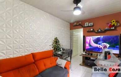 Imagem: A casa possui 2 Dormitórios, 2 Banheiros, 1 Vaga na garagem