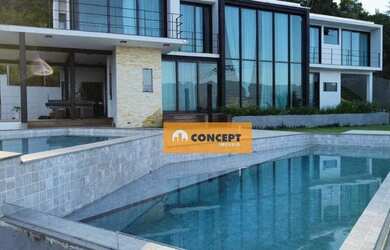 Imagem: A casa possui 5 Dormitórios, 5 Banheiros, 5 Vagas na garagem