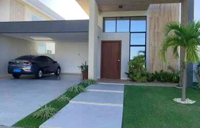 Imagem: A casa possui 3 Dormitórios, 3 Banheiros, 4 Vagas na garagem