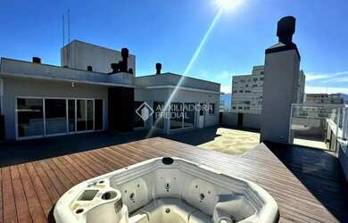 Imagem: O apartamento possui 5 Dormitórios, 5 Banheiros, 4 Vagas na