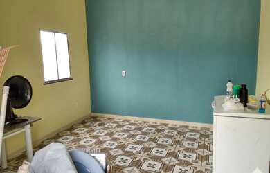 Imagem: A casa possui 2 Dormitórios e 1 Banheiro e está localizado