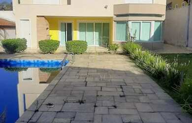 Imagem: A casa em condomínio possui 4 Dormitórios, 5 Banheiros, 4