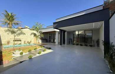 Imagem: A casa possui 3 Dormitórios, 4 Banheiros, 3 Vagas na garagem