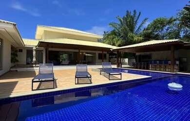 Imagem: A casa em condomínio possui 5 Dormitórios, 5 Banheiros, 4