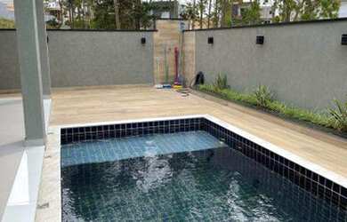 Imagem: A casa em condomínio possui 3 Dormitórios, 3 Banheiros, 4