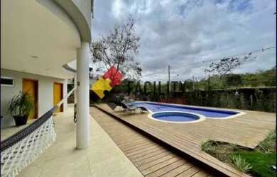 Imagem: A casa em condomínio possui 4 Dormitórios, 5 Banheiros, 5