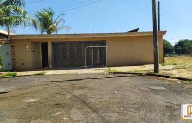 Imagem: A casa possui 3 Dormitórios, 3 Banheiros, 2 Vagas na garagem