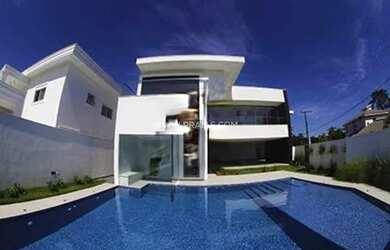 Imagem: A casa em condomínio possui 5 Dormitórios, 5 Banheiros, 5