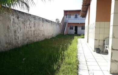 Imagem: A casa possui 3 Dormitórios, 2 Banheiros, 3 Vagas na garagem