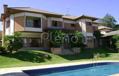 Imagem: A casa possui 5 Dormitórios, 5 Banheiros, 3 Vagas na garagem