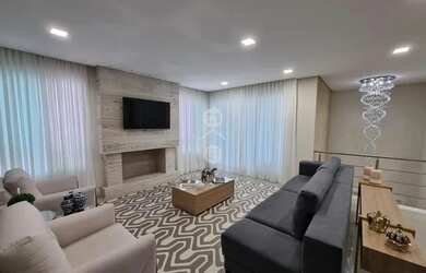 Imagem: A casa possui 4 Dormitórios, 4 Banheiros, 2 Vagas na garagem