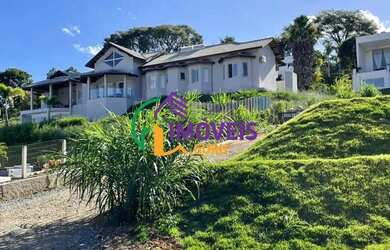 Imagem: A casa em condomínio possui 4 Dormitórios, 5 Banheiros, 5