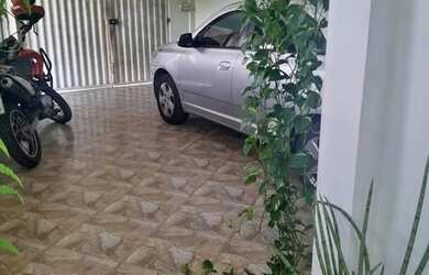 Imagem: A casa possui 2 Dormitórios, 1 Banheiro, 1 Vaga na garagem