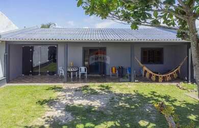 Imagem: A casa possui 3 Dormitórios, 2 Banheiros, 144m² de Área e