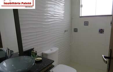 Imagem 16: Sobrado a venda no Ninho Verde, frente ao asfalto e lago do condomínio...