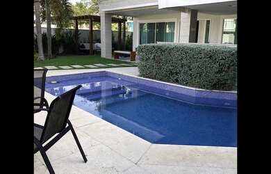 Imagem: A casa em condomínio possui 5 Dormitórios, 5 Banheiros, 5