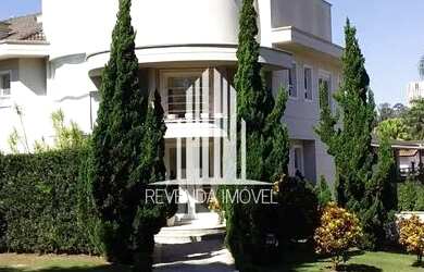 Imagem: A casa possui 4 Dormitórios, 5 Banheiros, 5 Vagas na garagem