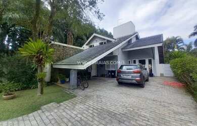 Imagem: A casa em condomínio possui 5 Dormitórios, 4 Banheiros, 4