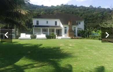 Imagem: A casa em condomínio possui 5 Dormitórios, 5 Banheiros, 5