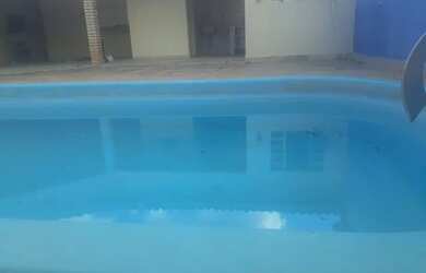 Imagem: A casa possui 3 Dormitórios, 3 Banheiros, 3 Vagas na garagem