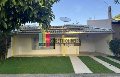 Imagem: A casa possui 3 Dormitórios, 3 Banheiros, 3 Vagas na garagem