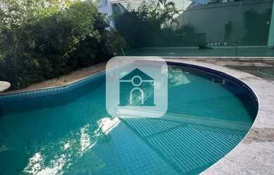 Imagem: A casa possui 3 Dormitórios, 4 Banheiros, 4 Vagas na garagem