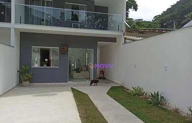 Imagem: A casa possui 4 Dormitórios, 5 Banheiros, 2 Vagas na garagem