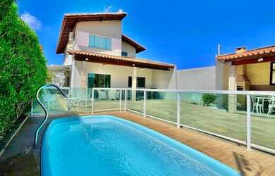 Imagem: A casa possui 4 Dormitórios, 4 Banheiros, 5 Vagas na garagem