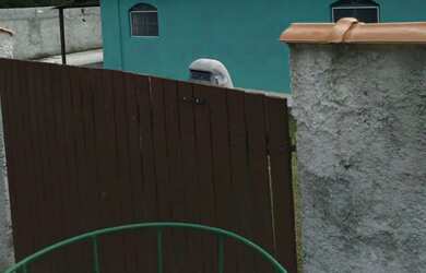 Imagem: A casa possui 2 Dormitórios, 1 Banheiro, 2 Vagas na garagem