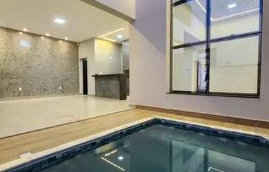 Imagem: A casa possui 3 Dormitórios, 2 Banheiros, 2 Vagas na garagem