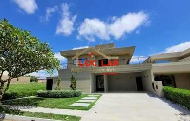 Imagem: A casa em condomínio para alugar possui 4 Dormitórios, 4 Banheiros