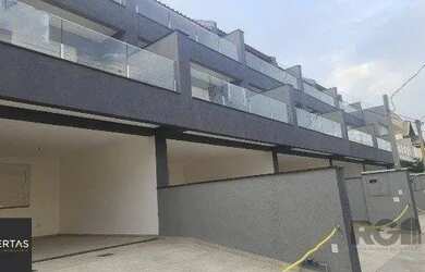 Imagem: A casa possui 3 Dormitórios, 3 Banheiros, 2 Vagas na garagem