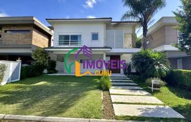 Imagem: A casa em condomínio possui 4 Dormitórios, 5 Banheiros, 4