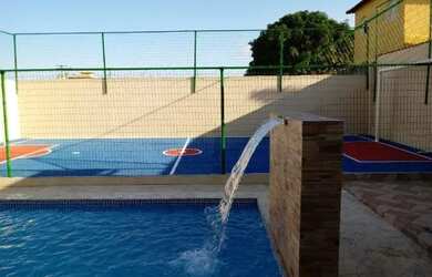 Imagem: A casa possui 3 Dormitórios, Acomodam 10 pessoas, 3 Vagas na