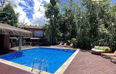 Imagem: A casa em condomínio à venda possui 4 Dormitórios, 4 Banheiros