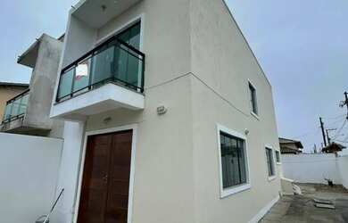 Imagem: A casa possui 2 Dormitórios, 3 Banheiros, 2 Vagas na garagem