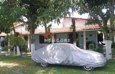 Imagem: A casa possui 3 Dormitórios, 4 Banheiros, 5 Vagas na garagem