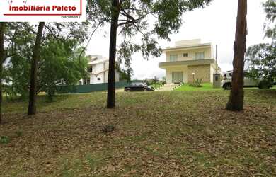 Imagem 5: Sobrado a venda no Ninho Verde, frente ao asfalto e lago do condomínio...